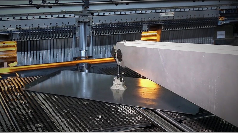 Laser cutting of sheet metal on CNC industrial laser cutting machine